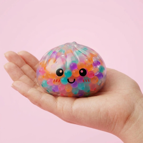 Squishy Dumpling Multicolor Burbujas Suaves en la mano, tamaño real