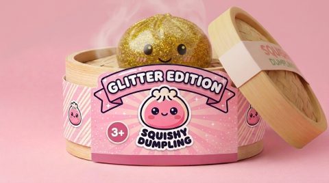 Glitter Dumpling Squishy Oro de Lujo en su cesta de vapor de bambú