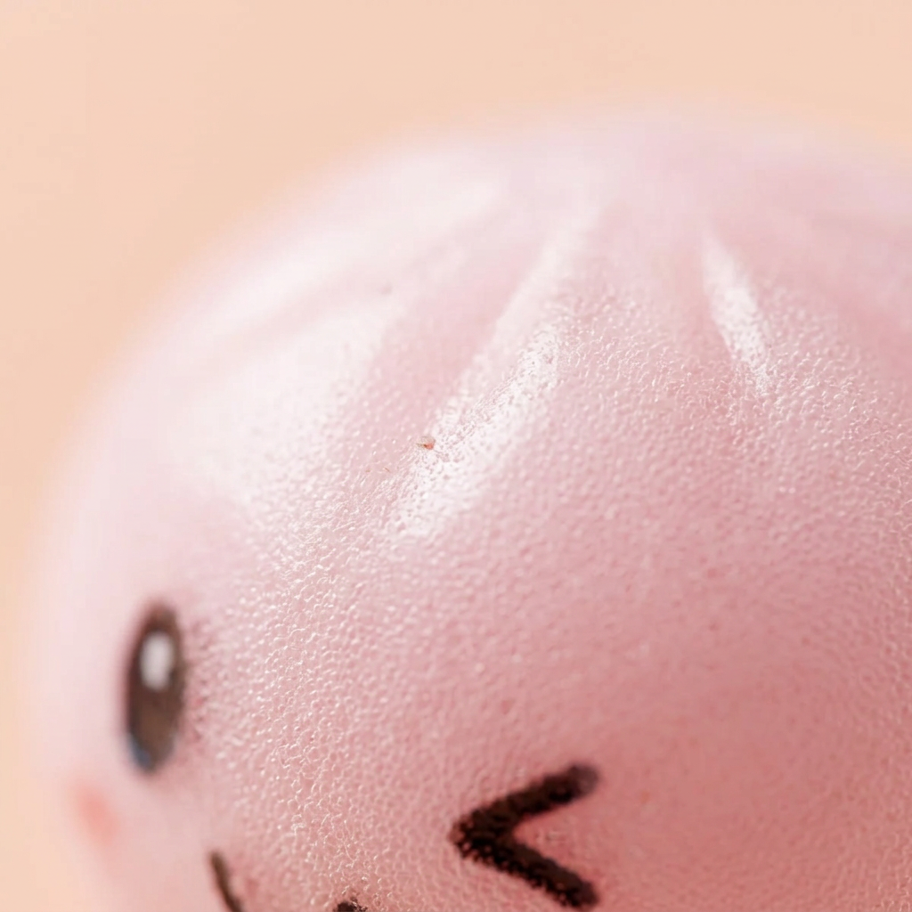 Dumpling Squishy Llavero Peluche X6 — primer plano macro de la textura