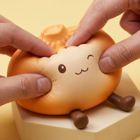 Giant Dumpling Squishy Naranja de Peluche — efecto slow-rise, la espuma recupera su forma