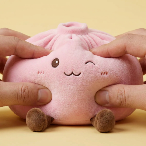 Squishy Dumpling Toy Rosa Gigante — efecto slow-rise, la espuma recupera su forma