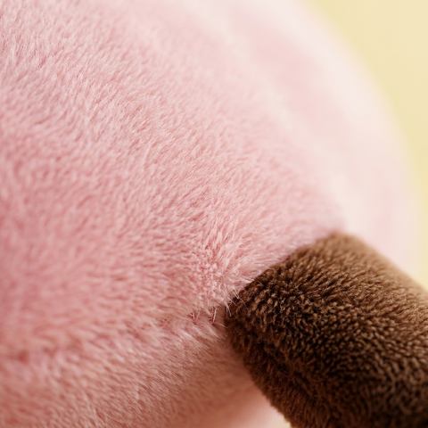 Squishy Dumpling Toy Rosa Gigante — primer plano macro de la textura