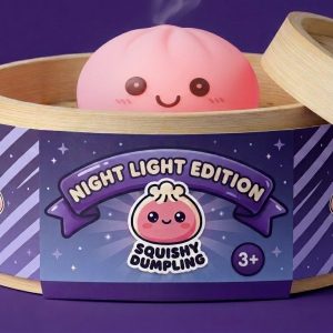 Dumpling Squishy Luz Nocturna Rosa en su cesta de vapor de bambú