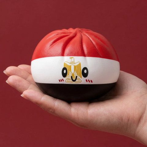 Flag Dumpling Squishy Egipto en la mano, tamaño real