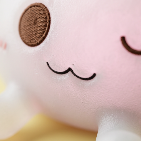 Dumpling Squishy Toy Blanco XXL — primer plano macro de la textura