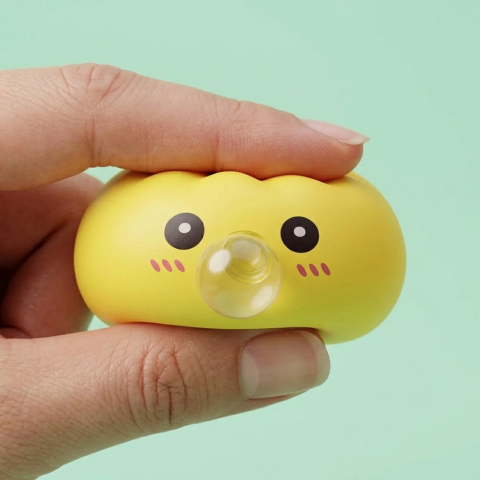 Jumbo Dumpling Squishy Amarillo Gigante — efecto slow-rise, la espuma recupera su forma