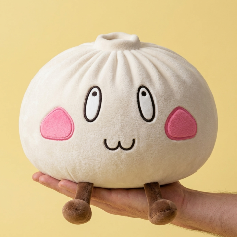 Giant Dumpling Squishy Cara Feliz en la mano, tamaño real