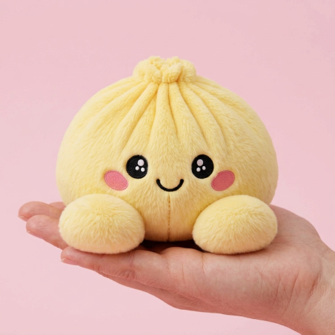 Dumpling Squishy Amarillo Limón en la mano, tamaño real